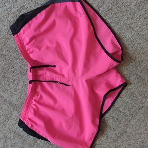 Pink Nike DRI Fit running shorts